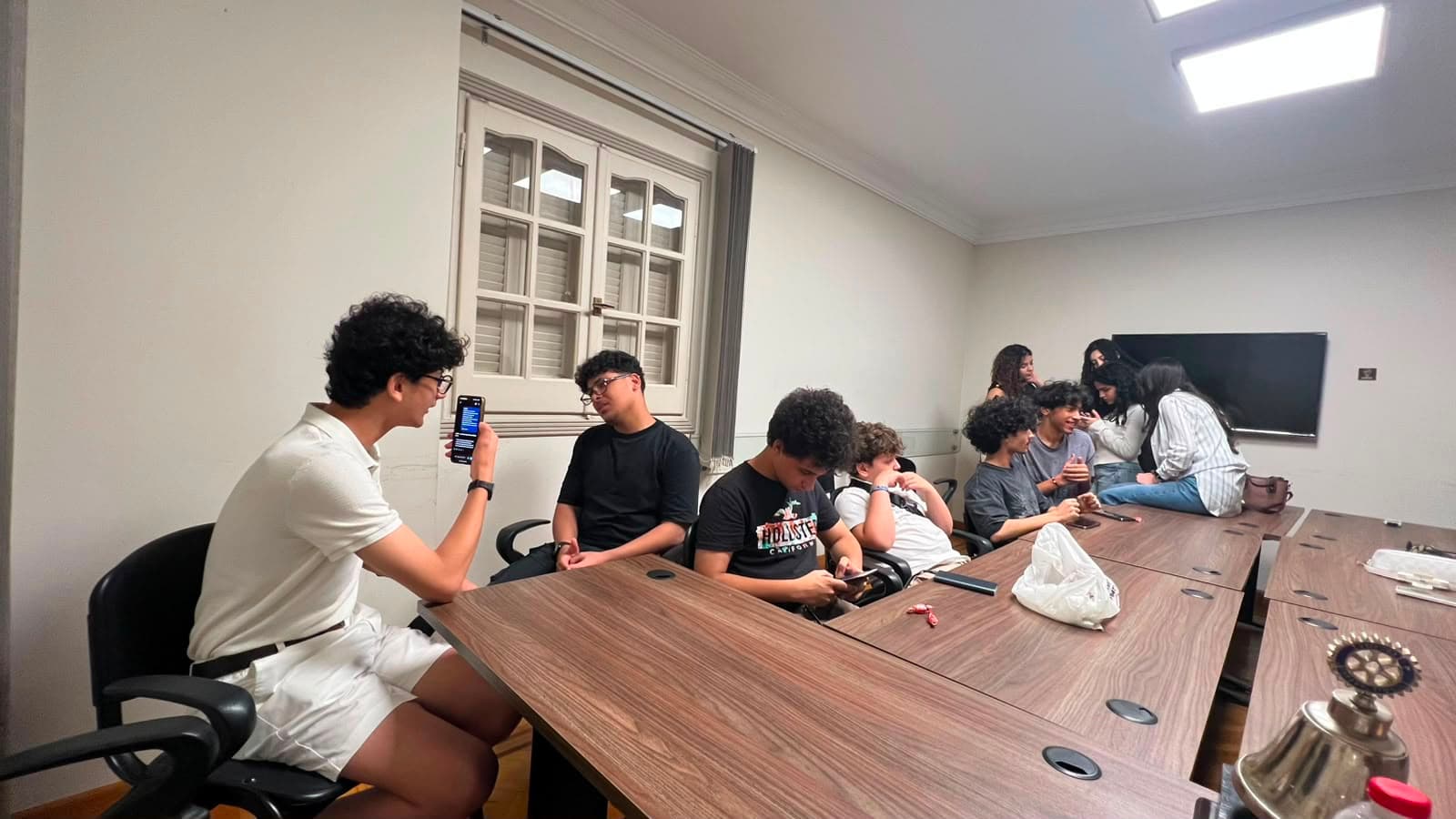 Members filming and coordinating during the IU video session