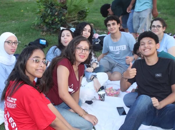 Interact Agora board and members at a park gathering